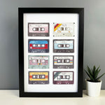 Welsh print featuring eight retro cassettes, each with a popular Welsh song title