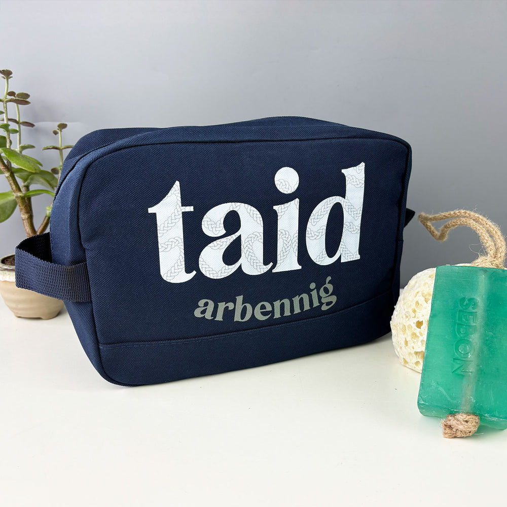 Navy wash bag featuring the words 'special grandad' in Welsh, Taid arbennig. 