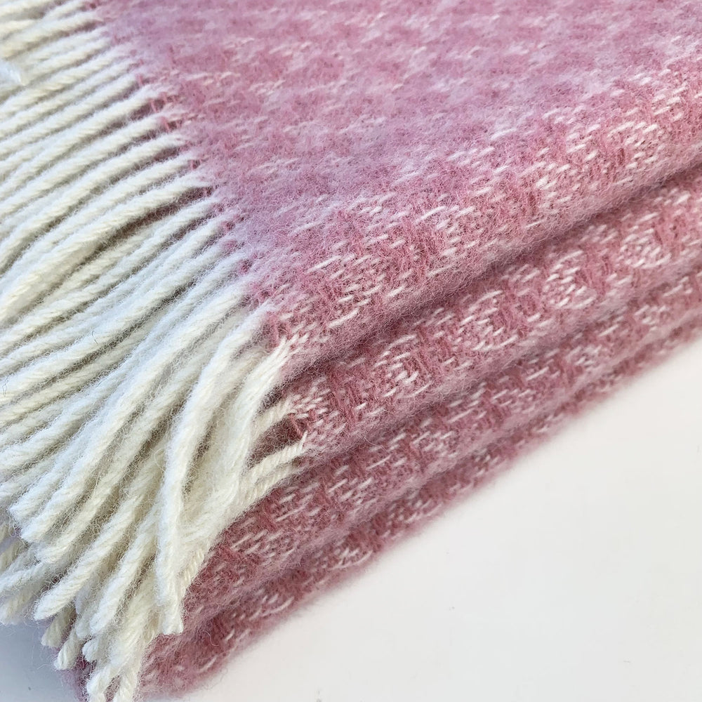 100% pure new wool crescent throw blanket in dusky pink made in Wales by Tweedmill