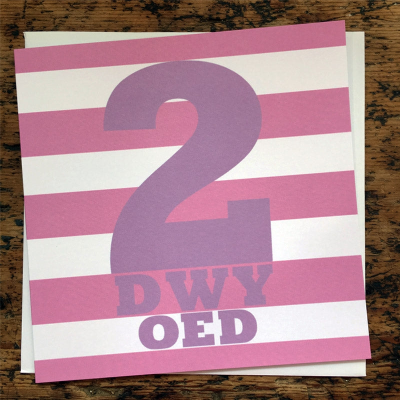 Welsh pink 2nd birthday card featuring the words 2 oed
