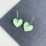 Enamel heart earrings side by side