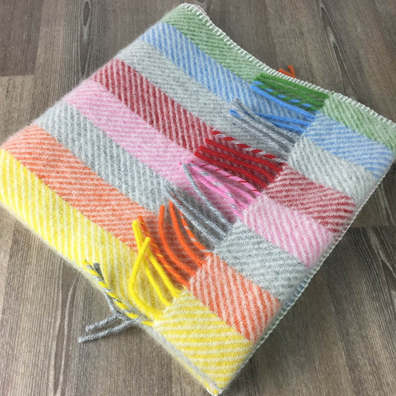 Wool Welsh pram blanket with rainbow stripes