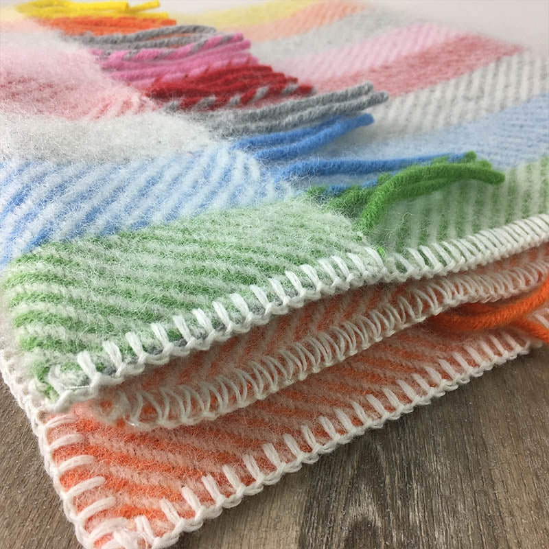 Wool Welsh pram blanket with rainbow stripes made in Wales by Tweedmill