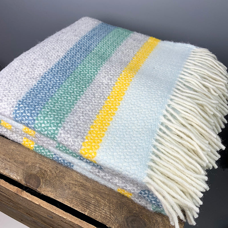 Welsh wool horizon throw in yellow, blue and grey stripes made in Wales by Tweedmill