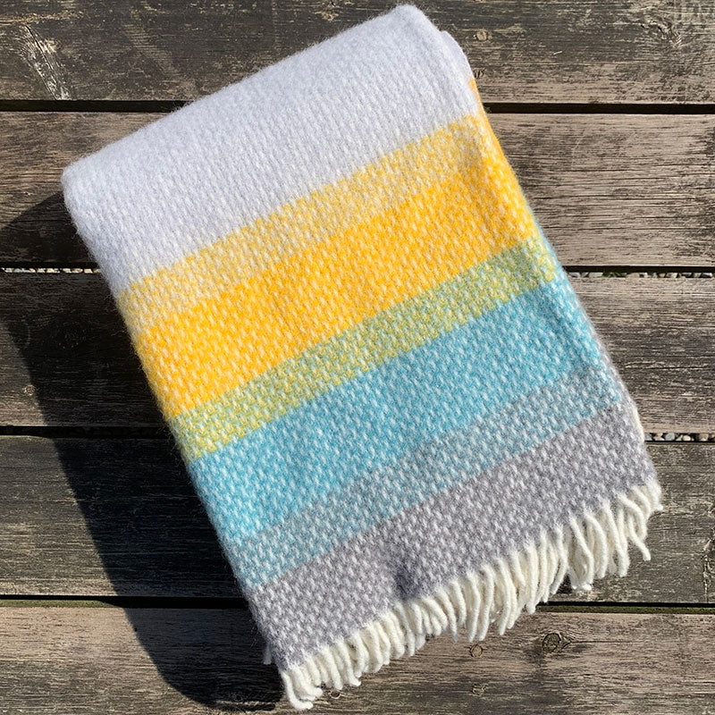 Welsh wool ombre throw in yellow, blue and grey stripes made in Wales by Tweedmill