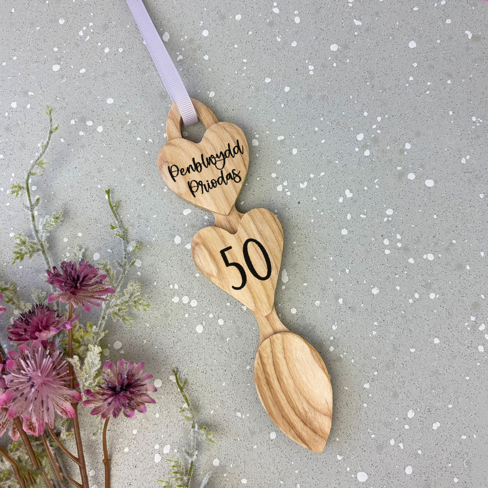 Engraved Welsh love spoons