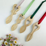 Wooden love spoon decorations, hand crafted in Wales in four traditional designs