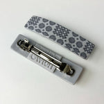 Handmade hair clips featuring the iconic Welsh blanket pattern in grey