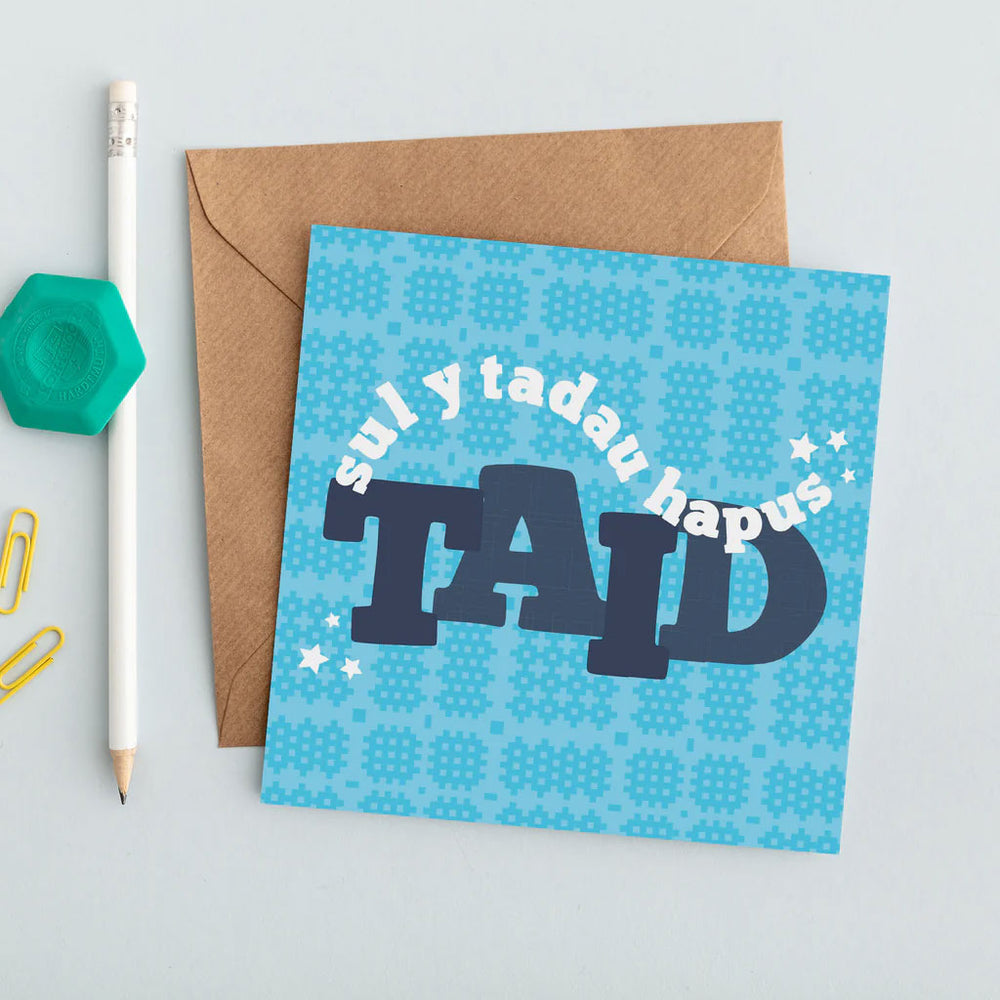 greeting card featuring the words 'happy father's day grandad' in Welsh - Sul y Tadau hapus Taid, on a Welsh blanket print background