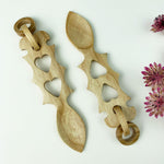 Hand crafted wooden Welsh lovespoon featuring hearts and links. Includes an&nbsp;explanation card of the meaning of carved symbols.