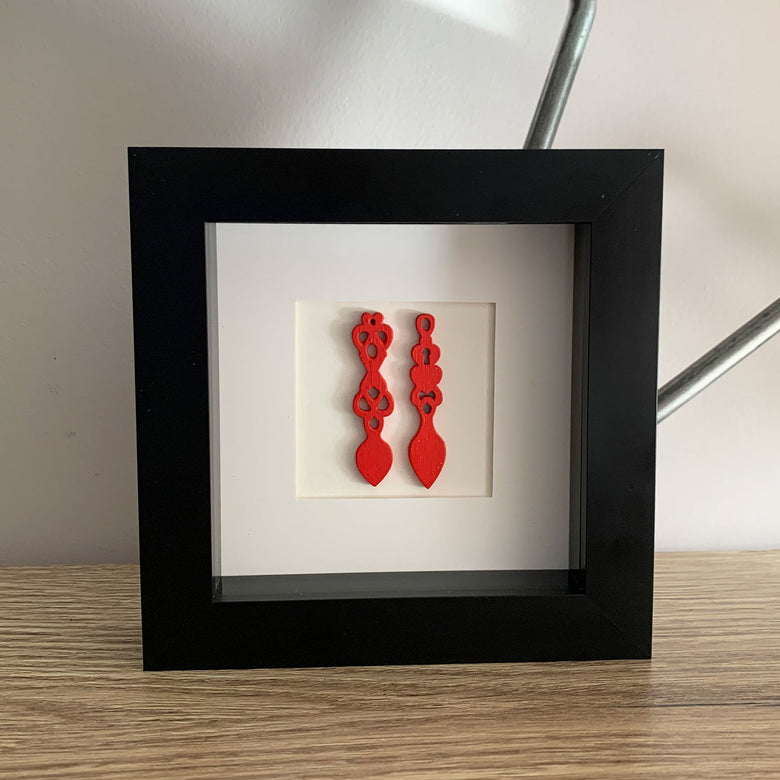 Framed Welsh love spoons - red/black frame