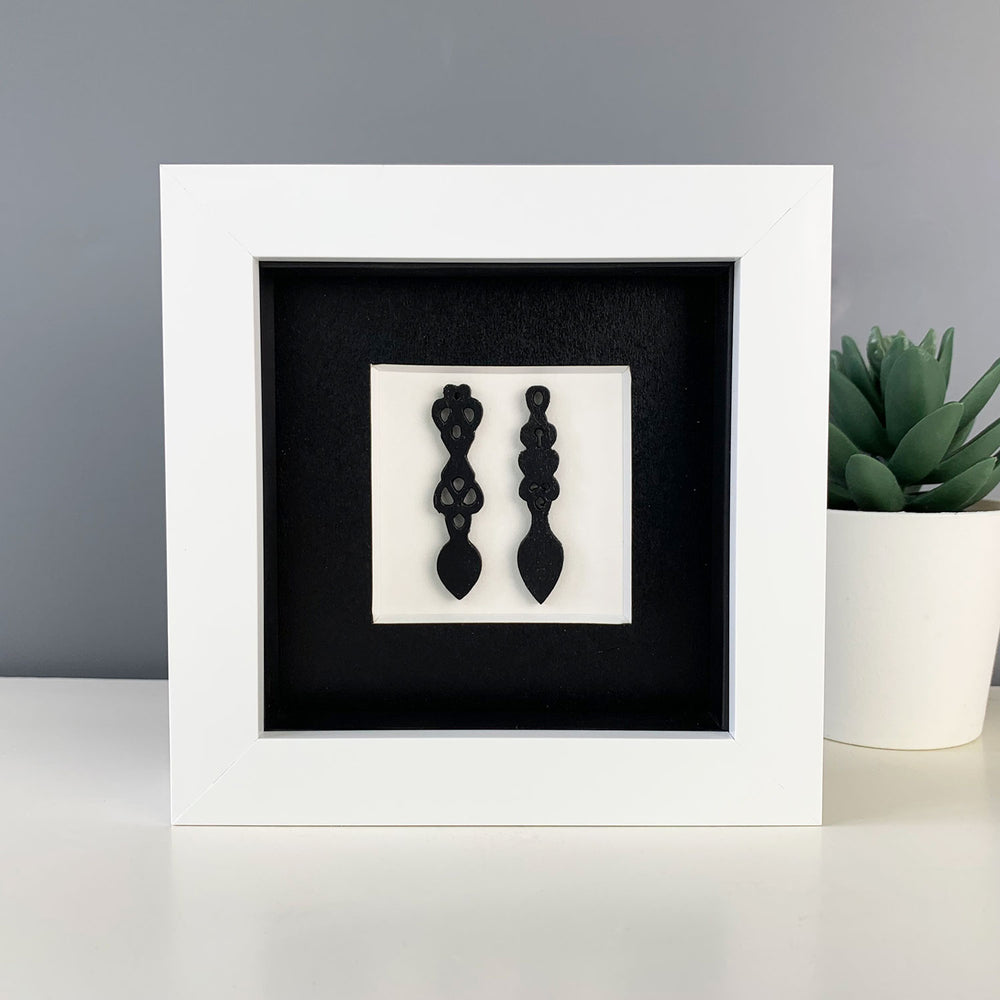 Framed Welsh love spoons - black/white frame