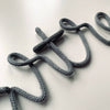 Knitted wire word - Cartref