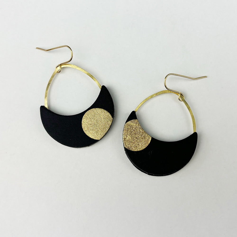 Handmade drop earrings made from double sided reclaimed leather earrings in black with gold circles