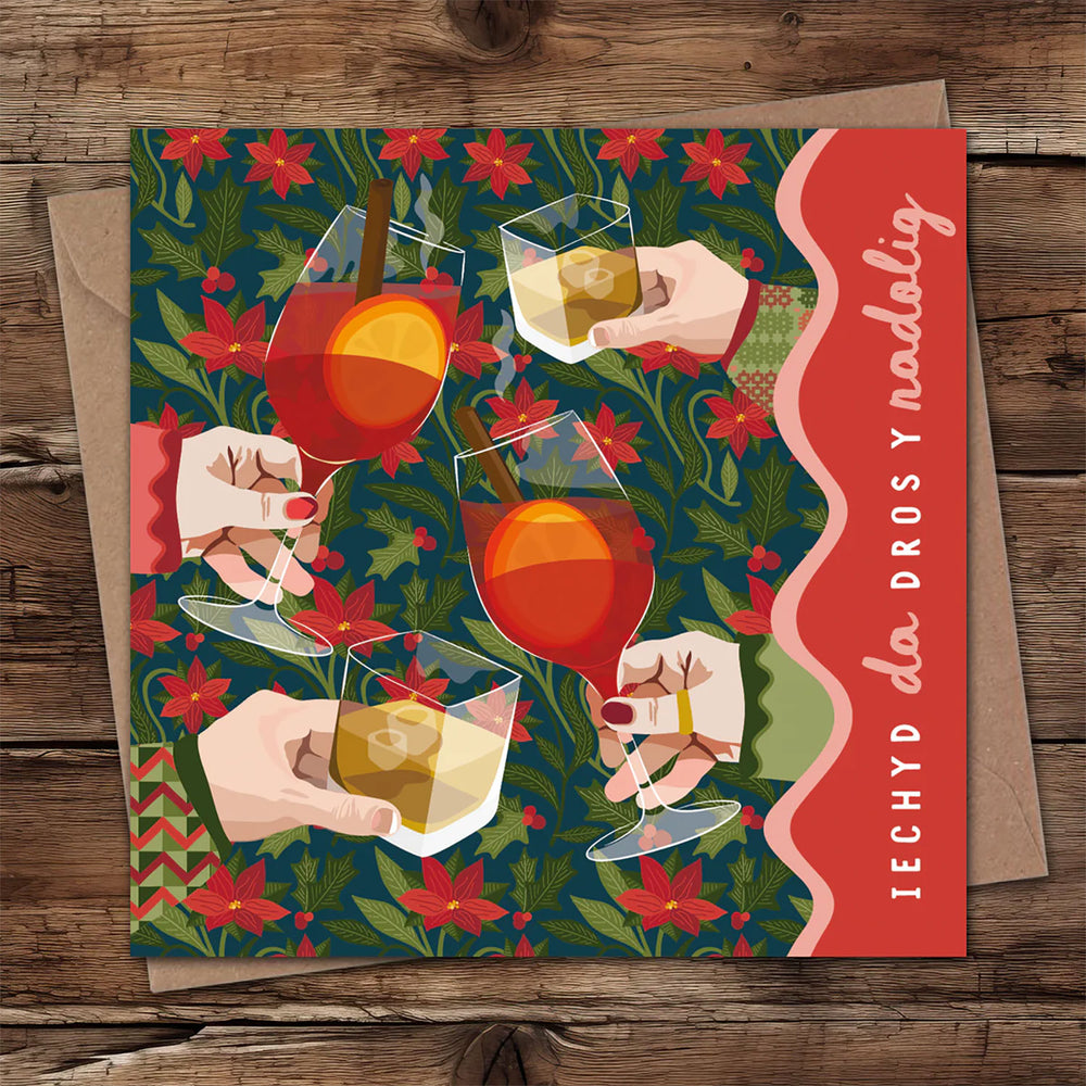 Welsh Christmas card by Max Rocks featuring the words 'Cheers over Christmas' in Welsh