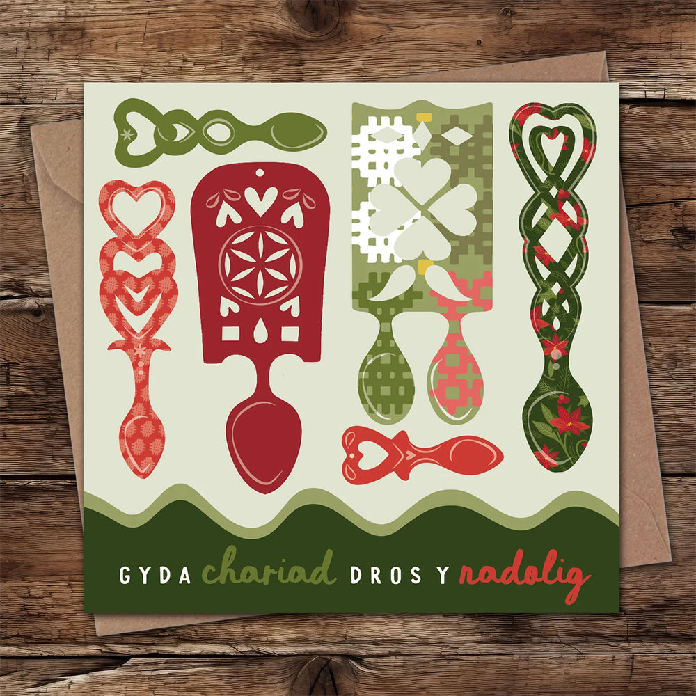 Welsh Christmas card by Max Rocks featuring the words 'With love over Christmas' in Welsh