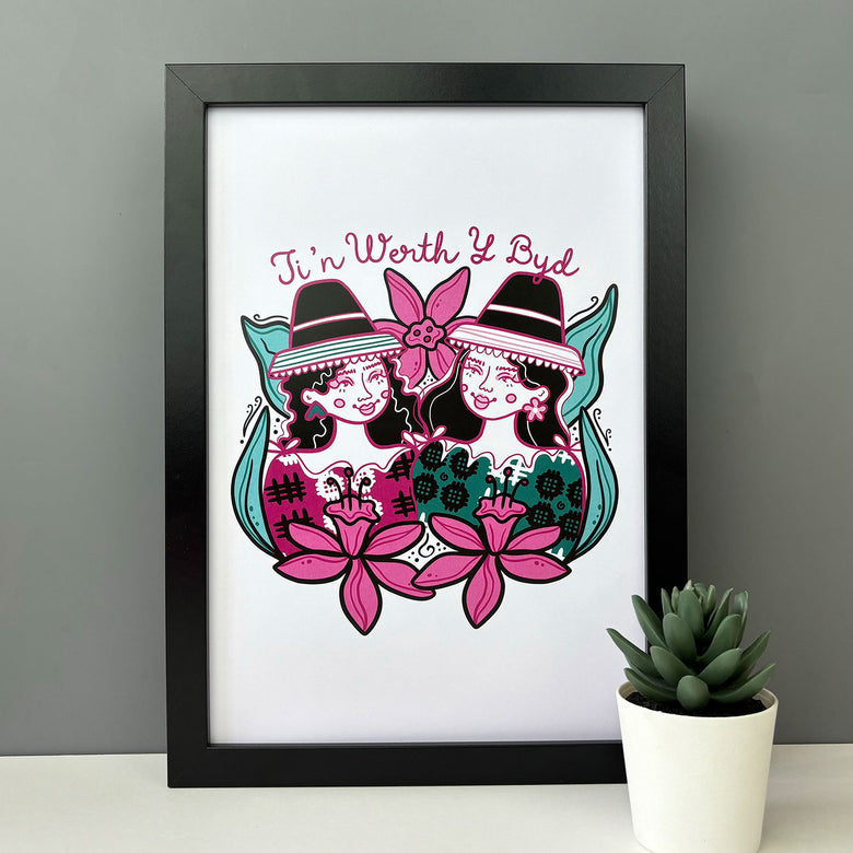 contemporary print featuring the Welsh ladies Mili and Lili and the words 'your're worth the world 'in Welsh, Ti'n werth y byd.