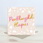 Contemporary greeting card featuring the words 'happy birthday' in Welsh - Penblwydd Hapus. 