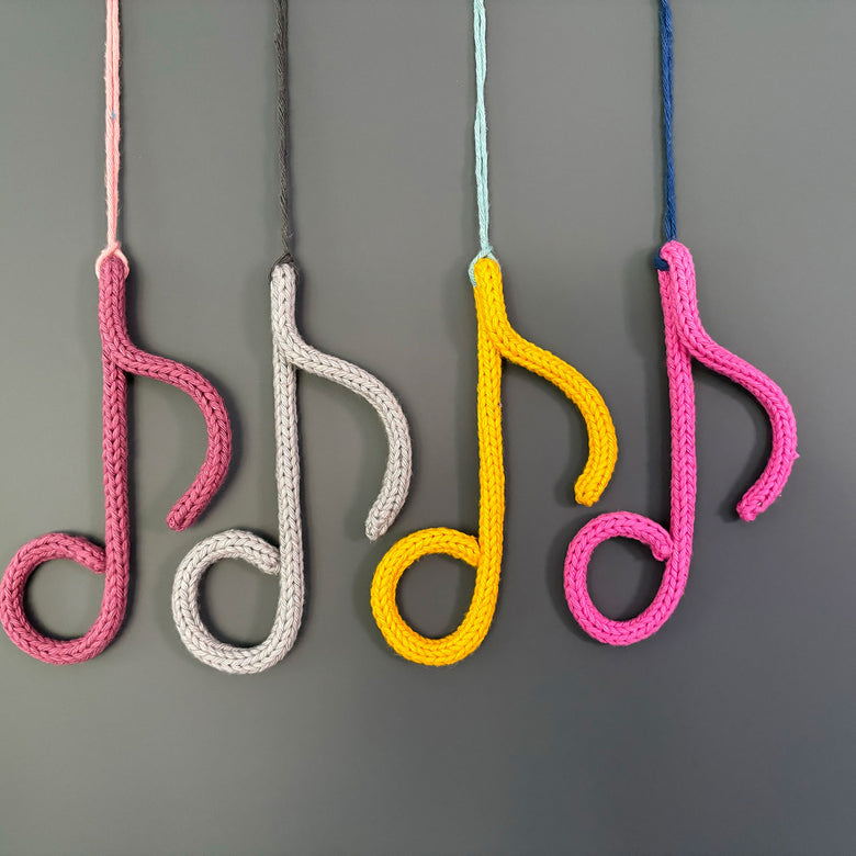 Knitted wire treble clef/musical notes