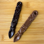 Two handmade milk and dark chocolate lovespoons by Welsh artisan chocolatiers Wickedly Welsh