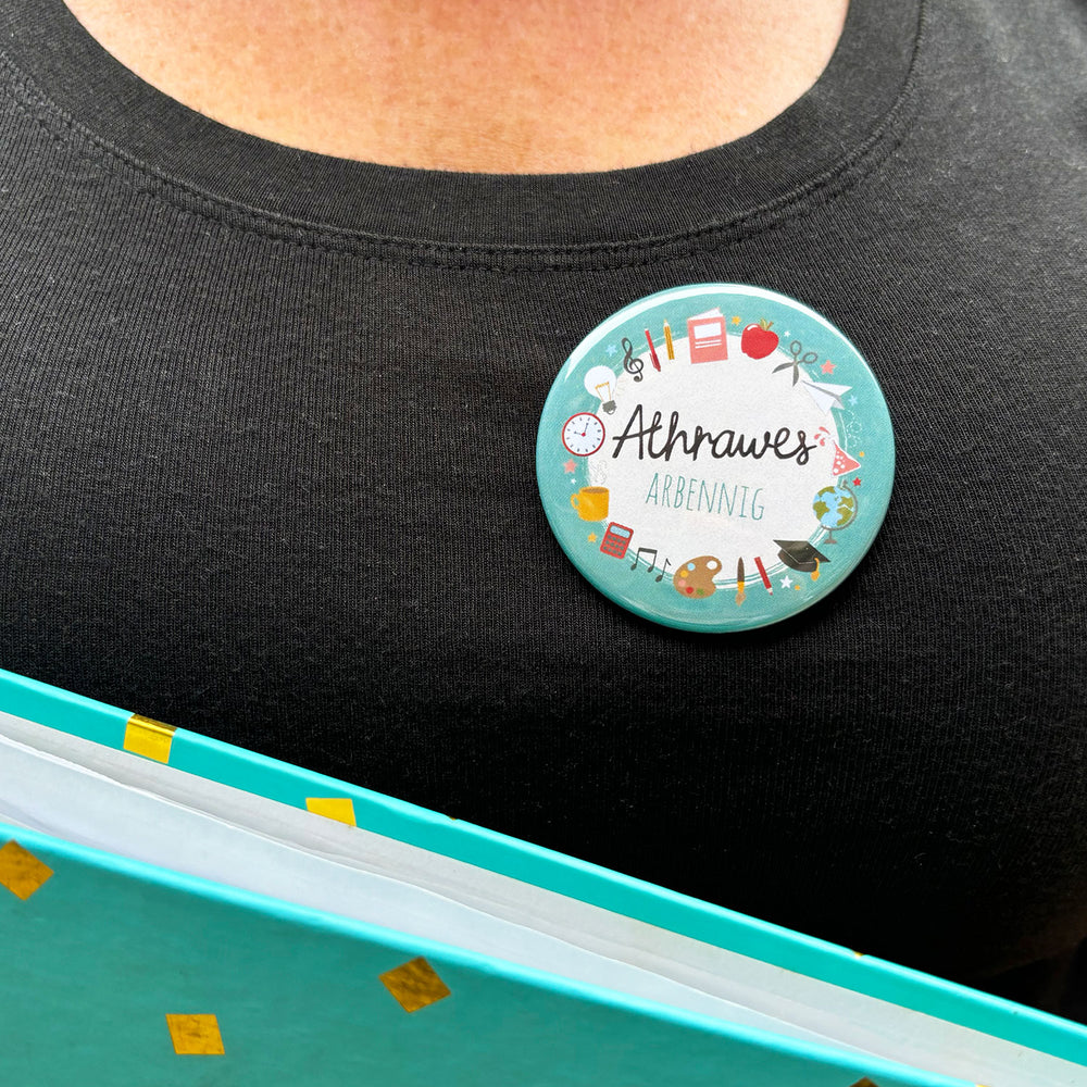 Handmade badge featuring the words 'special teacher' in Welsh