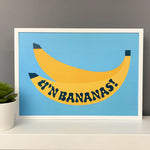 Welsh framed print featuring bananas and the words 'Ti'n bananas'