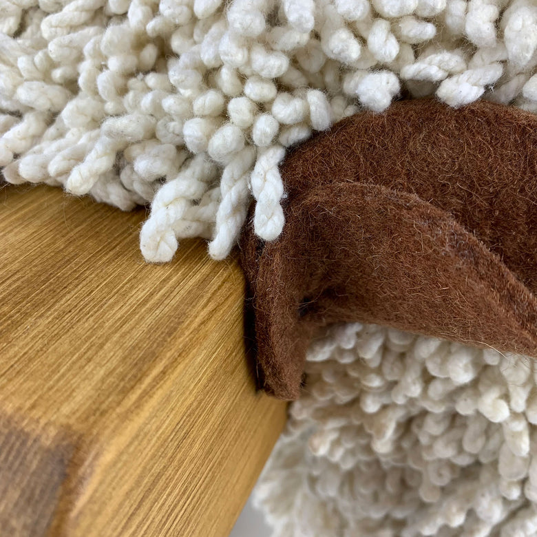 Ewemoo Welsh sheep footstool with ivory cotton twist fabric, oak head and legs