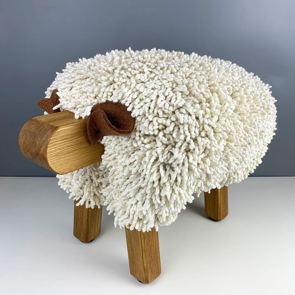 Ewemoo Welsh sheep footstool with ivory cotton twist fabric, oak head and legs