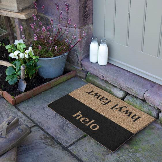 Coir doormat Welsh words for hello and goodbye on each side - helo/hwyl fawr