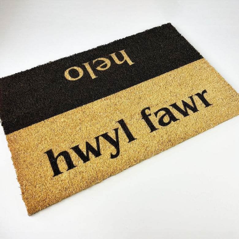 Coir doormat Welsh words for hello and goodbye on each side - helo/hwyl fawr