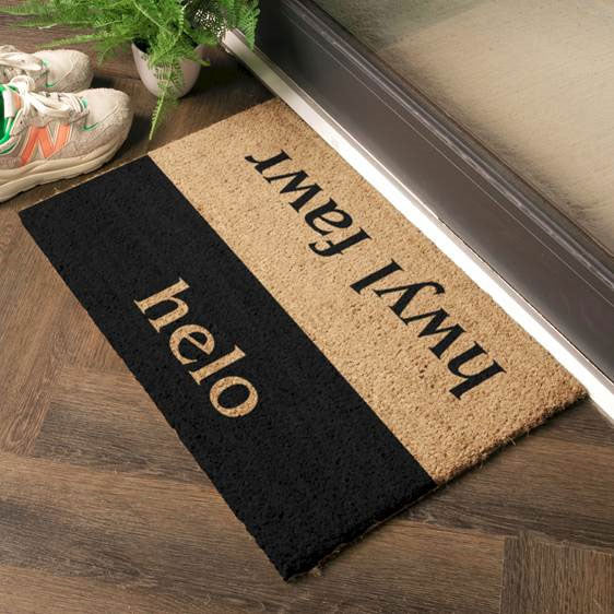 Coir doormat Welsh words for hello and goodbye on each side - helo/hwyl fawr