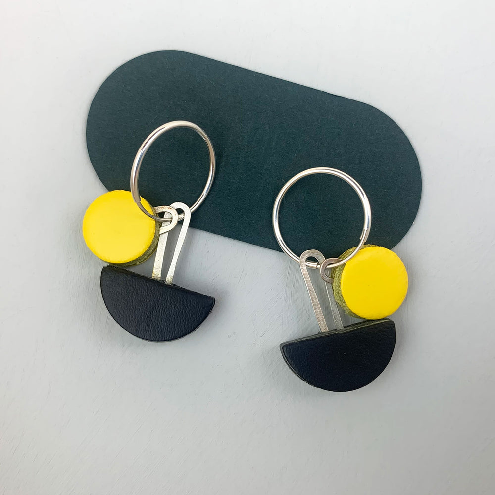 Yellow and black leather shapes on sterling silver hoop earrings