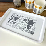 Melamine tray featuring the Welsh word 'cuppa' and hand drawn illustrations