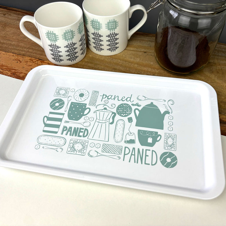 White melamine tray featuring the Welsh word Paned in duck egg blue