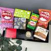 Hamper containing Welsh popcorn, chocolate, tea, fudge, waffles and shortbread