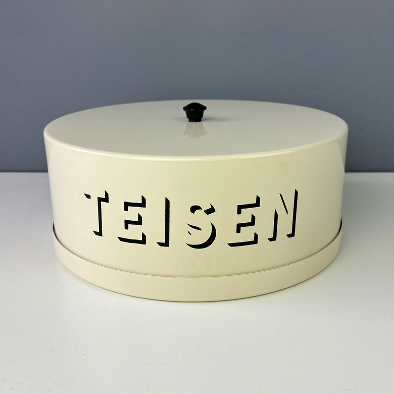 Vintage style cream enamel cake tin by JD Burford featuring the Welsh word Teisen