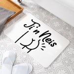 Welsh stone bath mat featuring the words ti'n neis