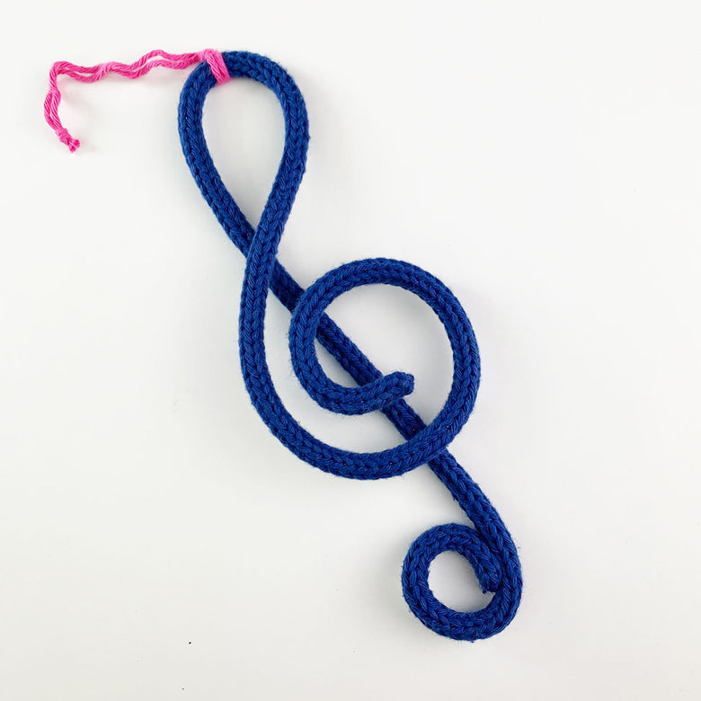 Knitted wire treble clef