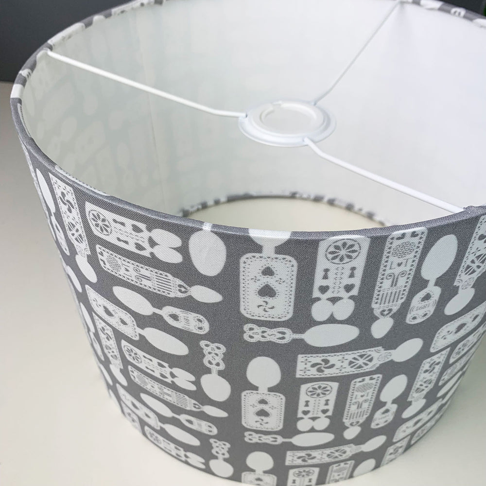 Closeup of the handmade welsh lampshade housewarming gift, there is a spoon pattern printed on the fabric