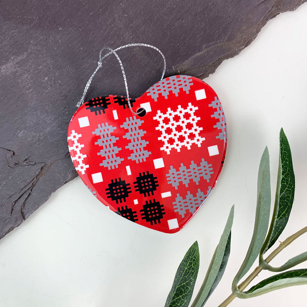 Heart shaped Christmas decoration with a silver string