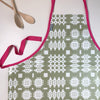Welsh oilcloth apron, green and pink