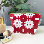 Red Welsh blanket print make-up bag with contrasting green zip