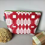 Red Welsh blanket print wash bag with contrasting green zip