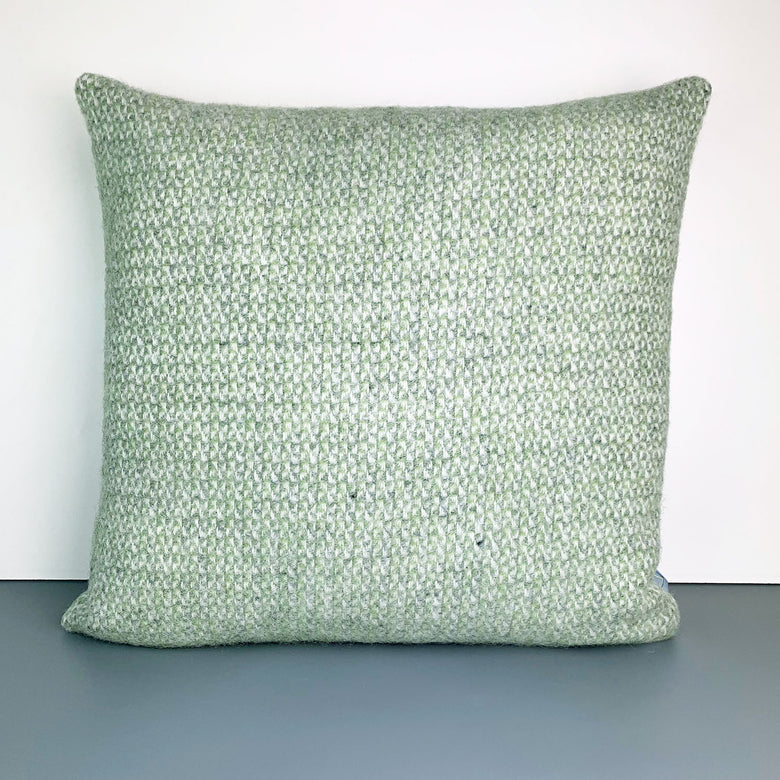 Pure new wool illusion cushion in green made in Wales by Tweedmill