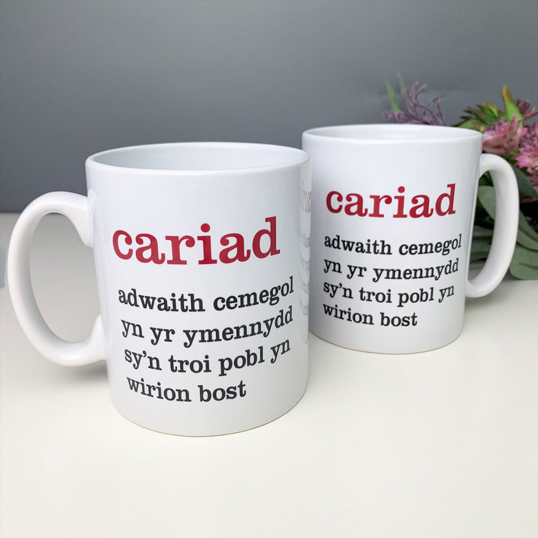 Welsh mugs Valentine's gifts with the definition of love written on them in Welsh