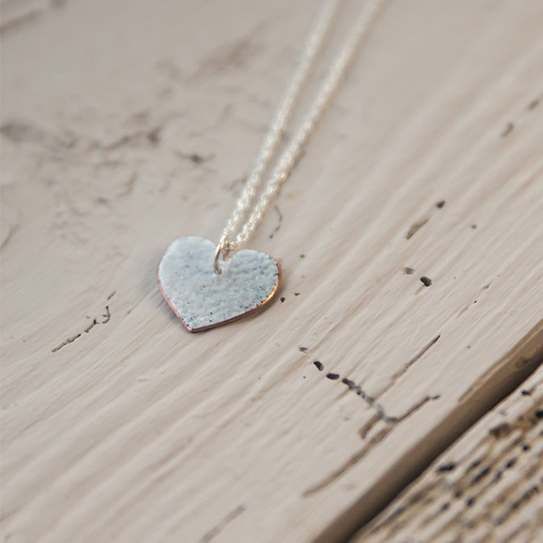 Closeup of heart pendant for Valentine's Day