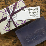 Handmade Welsh soap stamped with the word sebon, labelled with penblwydd hapus